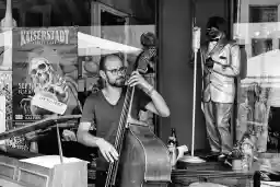 'Bassist Max Freytag Trio and Photographer' in a higher resolution